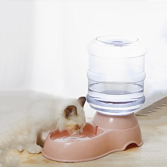 Distributeur croquettes et eau pour chat rose eau