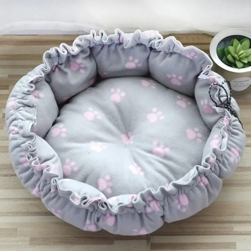 coussin pour chat gris pattes rose